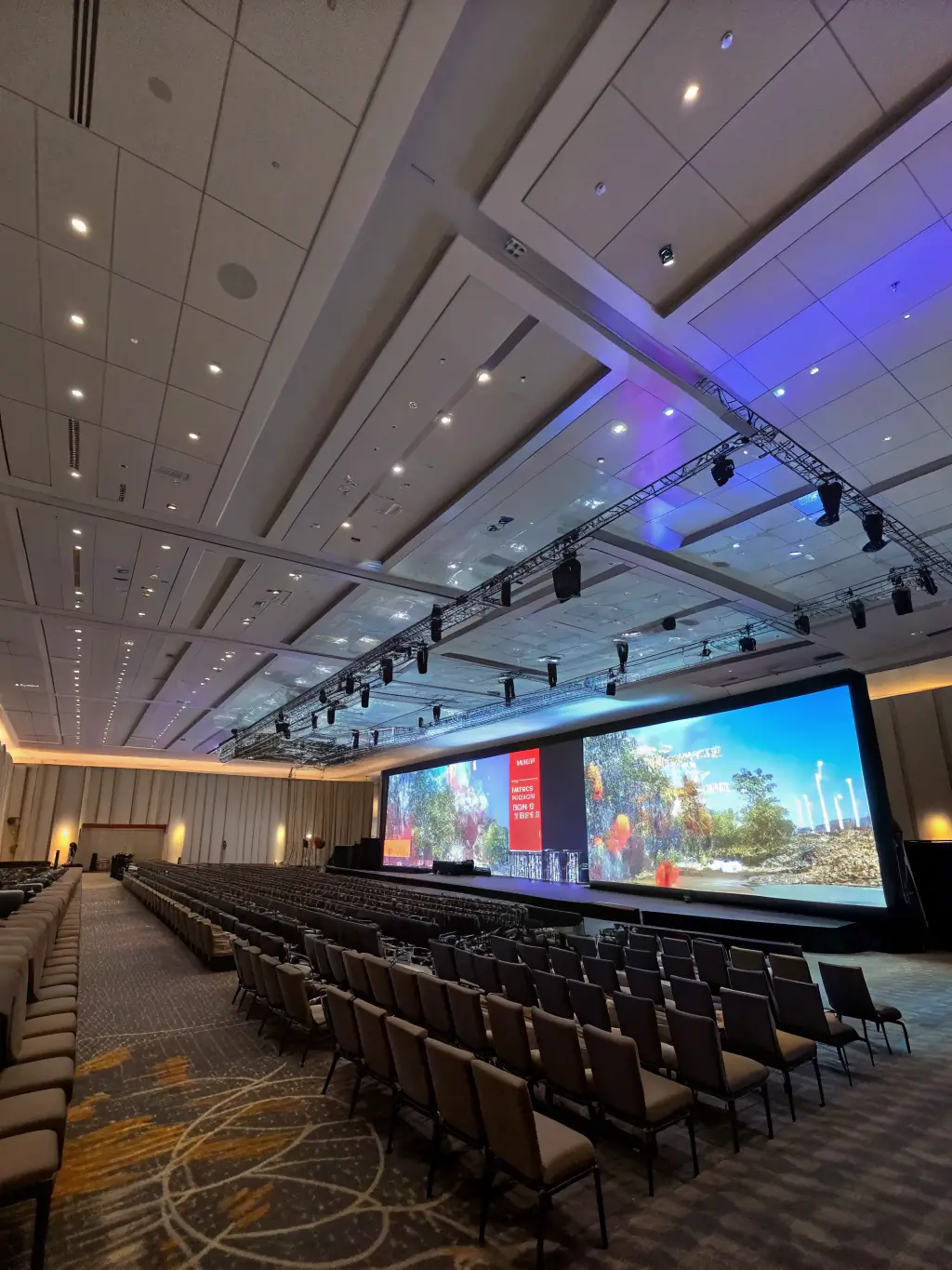 A modern projector displaying a crisp, high-resolution image during a business presentation, emphasizing the quality of rental equipment.